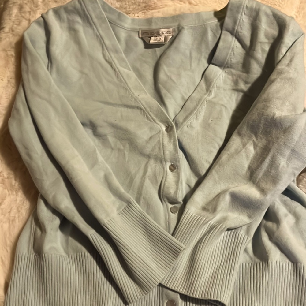 Light blue medium sweater.